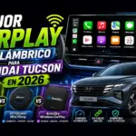 Hyundai Tucson equipado con Apple CarPlay inalámbrico mostrando la pantalla multimedia, varios adaptadores CarPlay recomendados para 2026.
